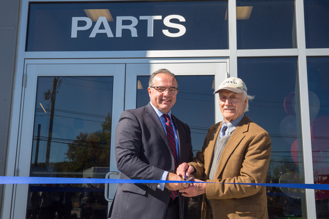 Dario Diesel Owner Dario Sabatini (right) and Rockland Trust’s Terry Katsaros (left) Celebrate Dario’s Re-opening