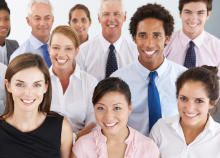 people smiling in group photo 