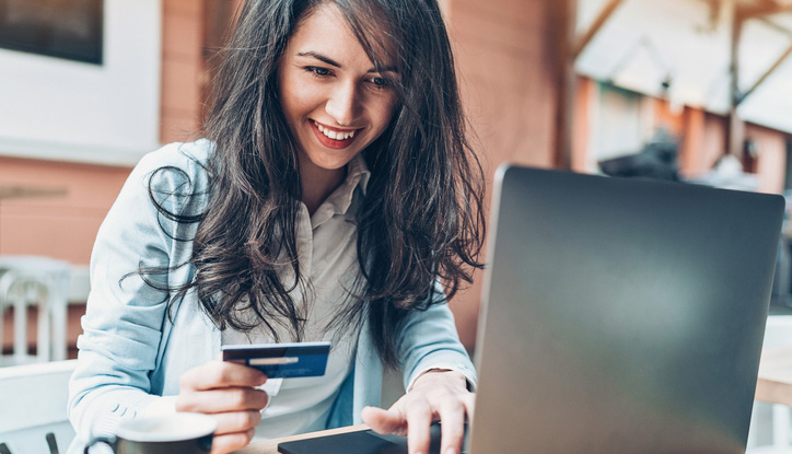 woman making a purchase on her laptop